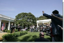 President George W. Bush and Iraqi interim Prime Minister Ayad Allawi hold a press conference in the Rose Garden Thursday, Sept. 23, 2004. During his address, President Bush listed some of the successes in Iraq, "Over 100 companies are now listed on the Iraqi stock exchange. And an average of five new companies are joining each week. Electricity has been restored above pre-war levels. Telephone service has increased dramatically. More than 2,000 schools have been renovated and millions of new textbooks have been distributed."  White House photo by Eric Draper