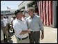 President George W. Bush greets Arthur Bourne, Police Chief of Gulf Shores, during a visit with First Responders at the Orange Beach Fire and Rescue Station 1 in Orange Beach, Alabama Sunday, Sept. 19, 2004. White House photo by Eric Draper