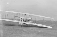 Orville piloting the third flight of December 17, 1903, Kitty Hawk, North Carolina