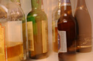 Blurry image of bottles of alcohol.