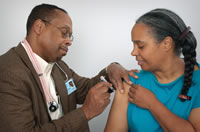 Woman receives vaccination