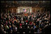 The House comes to its feet as President George W. Bush arrives at the podium Tuesday, Jan. 31, 2006, to give his State of the Union address.