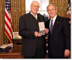 President George W. Bush stands with Forrest M. Bird after presenting him with the 2008 Presidential Citizens Medal Wednesday, Dec. 10, 2008, in the Oval Office of the White House. White House photo by Chris Greenberg
