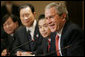 President George W. Bush shares a humorous exchange with members of the Chinese Leadership Program Fellows, Monday, June 5, 2006 at the Eisenhower Executive Office Building in Washington. White House photo by Eric Draper