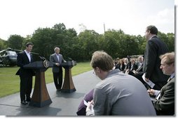 President George W. Bush and Prime Minister Anders Rasmussen of Denmark hold a joint news conference at Camp David Friday, June 9, 2006.  White House photo by Eric Draper