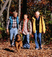 photo of older man, middle aged man, boy and dog