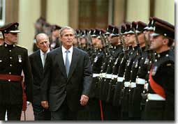 President reviews the guard
during his visit to Buckingham Palace July 19, 2001. White House photo
by Paul Morse.