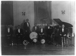 [Group of seven musicians including Charlie Miller, Elwood Wilson, and Robert Blatt, probably members of a Washington, D.C. orchestra, in a hotel at 2400 16th St., N.W.]
