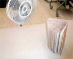 Using fan to air dry book