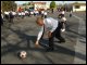 Secretary Paige plays kickball with W. Claude Hudnall Elementary students at recess during his visit to Inglewood, CA, on January 31, 2003. 