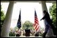 President George W. Bush approaches the podium to unveil his plan for the Middle East during a Rose Garden press conference Monday June 24. White House photo by Eric Draper.