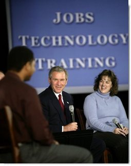 President George W. Bush chats with students about education and job training at Forsyth Technical Community College in Winston-Salem, N.C., Friday, Nov. 7, 2003  White House photo by Paul Morse