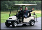 President George W. Bush waves to the media as he and Prime Minister Gordon Brown of the United Kingdom depart the landing zone at Camp David following the Prime Minister's arrival Sunday, July 29, 2007, to the presidential retreat in Thurmont, Maryland. White House photo by Eric Draper