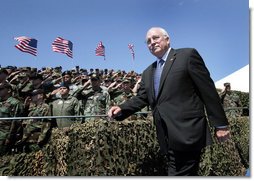 Vice President Dick Cheney is saluted by military personnel upon his arrival to a rally for the troops, Tuesday, August 29, 2006, at Offutt Air Force Base in Omaha, Neb. Offutt Air Force Base is home to the U.S. Strategic Command Headquarters and the Fighting 55th Wing, the largest wing in the Air Combat Command and the second largest in the Air Force. White House photo by David Bohrer