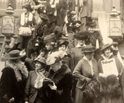 A crowd of women descending stairs outside a building