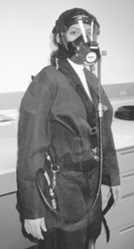 Photo of a worker wearing a supplied-air respirator