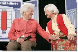 Former First Lady Barbara Bush speaks with Myrtle Campbell during a discussion on strengthening Social Security at Pensacola Junior College in Pensacola, Fla., Friday, March 18, 2005. White House photo by Eric Draper