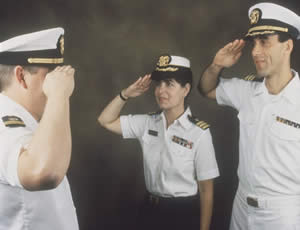 three officers saluting