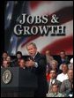 President George W. Bush addresses small business owners and employees during a roundtable discussion at the Robinson Center in Little Rock, Ark., Monday, May 5, 2003. White House photo by Susan Sterner