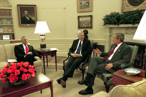 President George W. Bush meets with Senator John Danforth, the President's Special Envoy to the Sudan, center, and Secretary of State Colin Powell in the Oval Office Wednesday, May 21, 2003. White House photo by Susan Sterner.