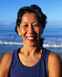 Happy, smiling woman at the beach