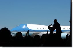 President George W. Bush delivers remarks at the upon arrival at South Bend, Indiana Regional Airport Thursday, September 5, 2002. White House photo by Tina Hager.