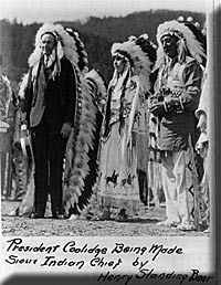 President Coolidge being made Sious Indian Chief
