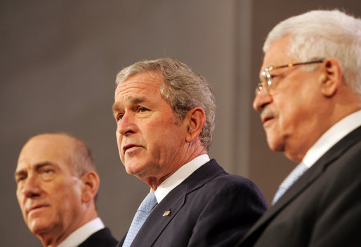 President George W. Bush reads from a joint statement by Israeli Prime Minister Ehud Olmert and Palestinian President Mahmoud Abbas, in which the leaders pledged to resume Mideast peace talks. The statement came during the Annapolis Conference in Annapolis, Maryland, and read, in part: "We express our determination to bring an end to bloodshed, suffering and decades of conflict between our peoples; to usher in a new era of peace, based on freedom, security, justice, dignity, respect and mutual recognition; to propagate a culture of peace and nonviolence; to confront terrorism and incitement, whether committed by Palestinians or Israelis." White House photo by Chris Greenberg
