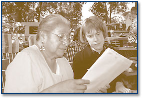 Image:Tribal member Maxine White works with AFC staffer Laurel McIntyre