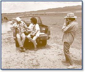 Image: Marilyn Bañuelos (right) photographs Connie Romero as she interviews rancher Corpus Gallegos on the vega