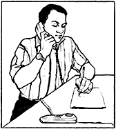Man on phone writing down information.