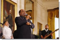 Kurt Carr and the Kurt Carr Singers perform for President George W. Bush and guests Tuesday, June 17, 2008 in the East Room of the White House, in honor of Black Music Month.  White House photo by Eric Draper
