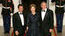 President George W. Bush and Mrs. Laura Bush stand with President Nicolas Sarkozy of France on the North Portico of the White House after his arrival for dinner Tuesday, Nov. 6, 2007.