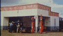 car at gas station