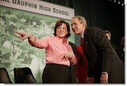 President George W. Bush talks with student Cari Aftosmes after a conversation on the Economy and the Jobs for the 21st Century Initiative at Central Dauphin High School in Harrisburg, PA.  White House photo by Paul Morse