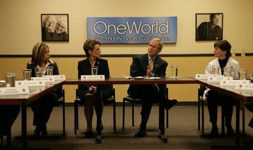 President George W. Bush participates in a meeting on health care Wednesday, Dec. 5, 2007, during a visit to the OneWorld Community Health Centers, Inc. in Omaha. Said the President afterwards, "This center serves -- 85 percent of its people don't speak English as a first language. By far, the vast majority are low-income. And yet they're receiving first-class quality care. So I thank the docs and the nurses and the social workers, and all the people who are making this facility such a good one." White House photo by Chris Greenberg