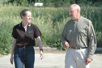 Christina Muedeking and Mark Kennett walk his Poweshiek County, Iowa, fields (NRCS photo -- click to enlarge)