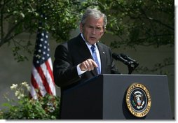 President George W. Bush emphasizes a point as he responds to a question Thursday, May 24, 2007, during a press conference in the Rose Garden of the White House.  White House photo by Joyce N. Boghosian
