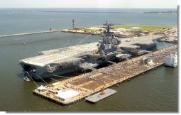 Thousands of people gathered at the Norfolk Naval Station in Norfolk, Va., to celebrate the commissioning of the USS Ronald Reagan, the U.S. Navy’s newest nuclear-powered aircraft carrier, July 12, 2003.   White House photo by David Bohrer