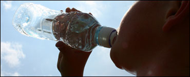 Photo: Person drinking water