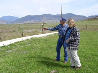 Rancher Bill Micke explaining the water savings of his cost-shared irrigation system.