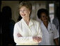 Mrs. Laura Bush smiles as she meets with patients and staff Monday, Feb. 18, 2008, doing a tour of the outpatient clinic at the Meru District Hospital in Arusha, Tanzania. White House photo by Shealah Craighead