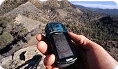 Photo: Person holding a GPS device