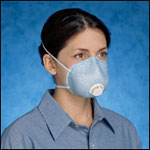 Photo:  Woman wearing an N95 respirator with valve