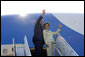 President George W. Bush waves upon his departure from Waco, Texas, en route Salt Lake City, Utah, to address the Veterans of Foreign Wars national convention August, 22, 2005. White House photo by Paul Morse