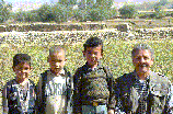 image of manuel ayela with afghan kids