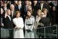 With his left hand resting on a family Bible, President George W. Bush takes the oath of office to serve a second term as 43rd President of the United States during a ceremony at the U.S. Capitol, Thursday, Jan. 20, 2005. Laura Bush, Barbara Bush, and Jenna Bush listen as Chief Justice William H. Rehnquist administers the oath. White House photo by Susan Sterner