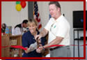 BLM-California State Director Mike Pool cuts a red ribbon with Barstow Field Office Manager Roxie Trost