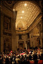 Thousands of mourners pay their respects to Pope John Paul II at St. Peter's Basilica at the Vatican in Rome Wednesday, April 6, 2005. White House photo by Eric Draper