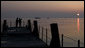 President George W. Bush and Russia's President Vladimir Putin share a quiet moment on a pier overlooking the Black Sea Saturday, April 5, 2008, at President Putin's summer retreat, Bocharov Ruchey, in Sochi, Russia. White House photo by Eric Draper